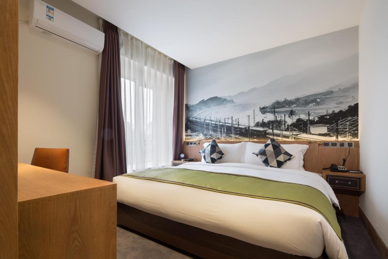 Dazhou Puli Hotel Bagian luar foto