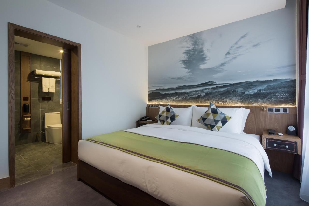 Dazhou Puli Hotel Bagian luar foto